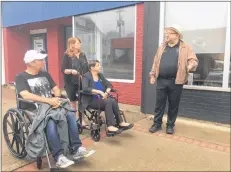  ?? CARLA ALLEN ?? Podiatrist Mike Innis addresses Yarmouth town councillor­s Wade Cleveland and Sandy Dennis (assisted by her daughter Charlene Wilcox) as they set out on the July 18 wheelchair challenge.