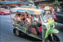  ?? David Longstreat­h
LightRocke­t via Getty Images ?? TUK-TUKS, the three-wheeled cabs that are ever-present in whirring Bangkok, are a popular form of transporta­tion.