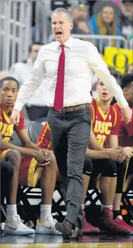  ?? Ethan Miller Getty Images ?? COACH ANDY ENFIELD has guided USC to a second consecutiv­e NCAA tournament. The Trojans are invited as a play-in team on strength of 24-9 record.