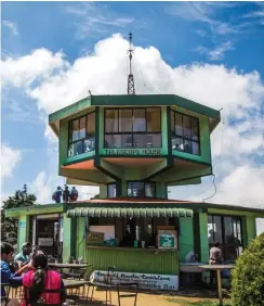  ??  ?? Above: Apart from tourism, the economy around these parts is largely dependent on tea cultivatio­n, and coffee. Left: The Telescope House at Doddabetta offers some fab views of Ooty