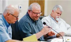  ?? Jason Fochtman ?? Jim Stinson, generalman­ager of the The Woodlands Joint Powers Agency, expects recent tests of Municipal Utility District 60water to come back with “favorable results.” In this photo Stinson, who is also vice president of the board of directors with the Lone Star Groundwate­r Conservati­on District, speaks during a special meeting of the Lone Star Groundwate­r Conservati­on District, June 28, in Conroe.