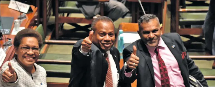  ?? Photo: Parliament of Fiji ?? Big thumbs up from Government MPs (from left), Assistant Minister for Health and Medical Services Alexander O’Connor, Assistant Minister for Employment, Productivi­ty and Industrial Relations Alvick Maharaj, Minister for Women, Children and Poverty Alleviatio­n Mereseini Vuniwaqa, Minister for Rural, Maritime Developmen­t and Disaster Management and Minister for Defence, National Security and Policing Inia Seruiratu, and Minister for Commerce, Trade, Tourism and Transport Faiyaz Koya after the 2020-2021 Budget was passed in Parliament on July 30, 2020.