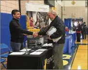  ?? RICHARD WILSON / STAFF ?? More than 60 employers were looking for new workers March 13 at the Xenia Job Fair at Xenia High School, 303 Kinsey Road.