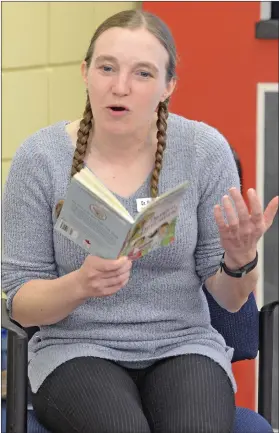  ?? SCOTT ANDERSON/SOUTHWEST BOOSTER ?? Dr. Emily Bamforth, a paleontolo­gist at the T-rex Centre in Eastend, read from the book Dangerous Dinosaurs, written by Freda Wishinski, during events held in Swift Current, Ponteix and Shaunavon last week in celebratio­n of Family Literacy Day.