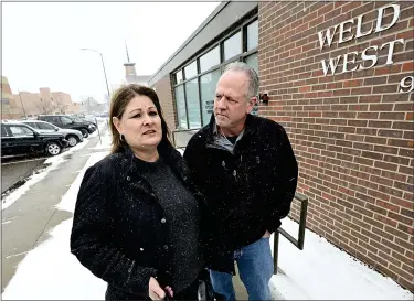  ?? JENNY SPARKS — LOVELAND REPORTER-HERALD ?? Shannon Steward, left, and John Steward, son and daughter-in-law of Karen Garner, talk Wednesday, Feb. 15, 2023, outside of the Weld County Criminal Justice Services building in Greeley. Three members of the Weld County Community Correction­s board voted unanimousl­y to deny transferri­ng former Loveland Police Officer Austin Hopp to a halfway house in Weld County.