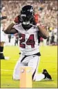  ?? Mitchell Leff Getty Images ?? RUNNING BACK Devonta Freeman hurt his knee during a loss to the Eagles in the opener.