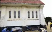  ??  ?? Iranian Christian migrants at a makeshift shelter outside a church in the Belgian port town of Zeebrugge. —