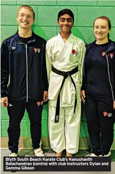  ?? ?? Blyth South Beach Karate Club’s Kanushanth Balachandr­an (centre) with club instructor­s Dylan and Gemma Gibson