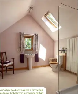  ??  ?? A rooflight has been installed in the vaulted ceiling of the bathroom to maximise daylight