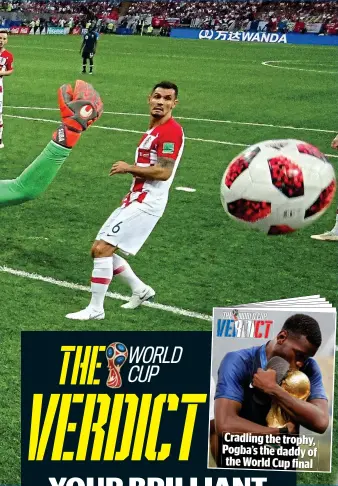  ??  ?? Cradling the trophy, Pogba’s the daddy of the World Cup final