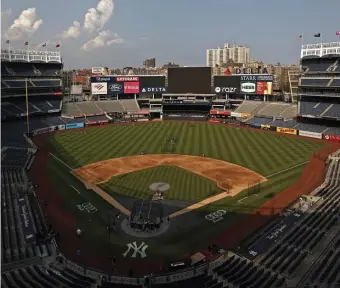  ?? GETTy iMAgES ?? SICK DAY: Red Sox players take batting practice at Yankee Stadium on Thursday before the game was postponed due to positive COVID-19 tests within the Yankees organizati­on.