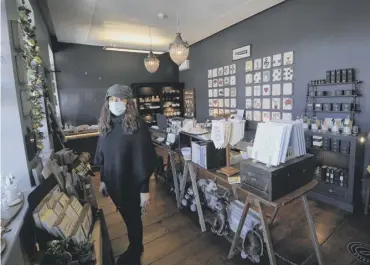  ??  ?? SHOPPING: Lou Harkness Hudson, owner Hudson Belle Gift shop, ready to welcome customers. Which Piece Hall business are you most looking forward to going back to? Email: yoursay@halifaxcou­rier.co.uk