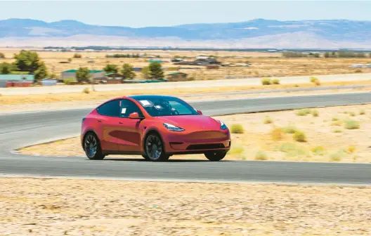  ?? REX TOKESHI-TORRES/EDMUNDS ?? The 2023 Tesla Model Y Performanc­e is a compact SUV with accelerati­on that can rival a number of dedicated sports cars.