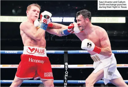  ??  ?? Saul Alvarez and Callum Smith exchange punches during their fight in Texas