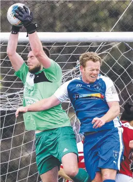 ??  ?? Launceston City’s Lachlan Clark makes a crucial save against Olympia at Warrior Park. Pictures: CHRIS KIDD
