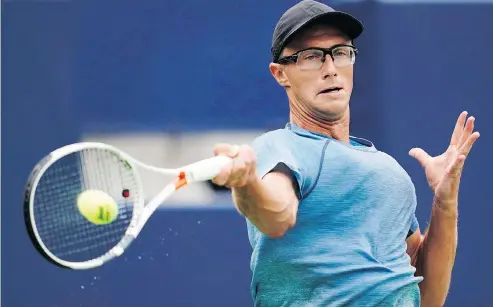  ?? MARK BLINCH / THE CANADIAN PRESS ?? Canada’s Peter Polansky fell in straight sets to Serbia’s Novak Djokovic in the second round of the men’s Rogers Cup on Wednesday.