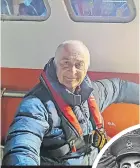  ?? ?? Tony on a fishing trawler as he explores the work done on the Thames at night