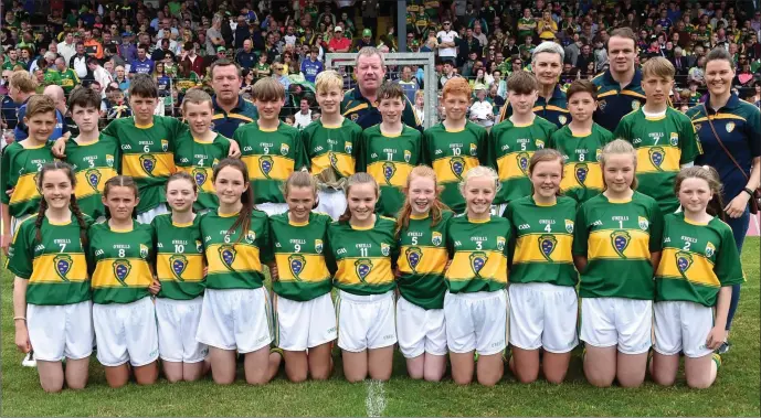  ??  ?? The Kerry Primary School Boys and Girls teams with mentors Colm Hanafin, Tomás Hanafin, Mary Jo, Kevin Enright, Joanne Brosnan at the Munster Senior and Minor Football finals at Fitzgerald Stadium, Killarney on Sunday. Photo by Michelle Cooper Galvin