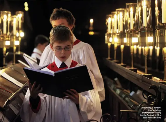  ??  ?? Celebratin­g a century: King’s College choristers rehearsing for the Festival of Nine Lessons and Carols