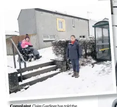  ??  ?? Complaint Claire Gardiner has told the council that she cannot get to her closest bus stop because of stairs to negotiate to ground level. Claire is pictured with mum Liz