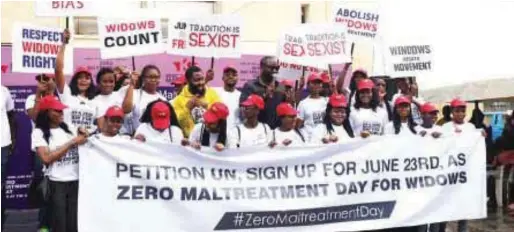  ??  ?? Cross Section of petitioner­s alongside comedian Bayegun Oluwatoyin aka Woli Arole, Dr. Felix King, and popstar, Harrison Tare Okiri aka Harry Song at the widows’ rights movement tagged Zero maltreatme­nt day campaign held in UNILAG, Lagos … recently