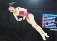  ??  ?? Bend it like
Farah: Farah Ann competing in the artistic gymnastics event during the 2018 Commonweal­th Games in Gold Coast. — AFP