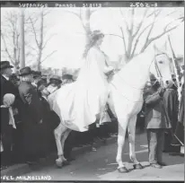  ?? Associated Press ?? In this photo provided by the Library of Congress taken in 1913, attorney Inez Milholland Boissevain rides astride in suffrage parade in Washington as the first of four mounted heralds.
