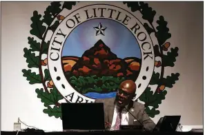  ?? (Arkansas Democrat-Gazette/Thomas Metthe) ?? Little Rock Mayor Frank Scott Jr. discusses a motion Tuesday during the city Board meeting at Southwest High School before the vote on his revised “Rebuild the Rock” sales tax proposal. If voters approve the measure, the city’s sales-tax rate would increase by five-eighths percent in January.