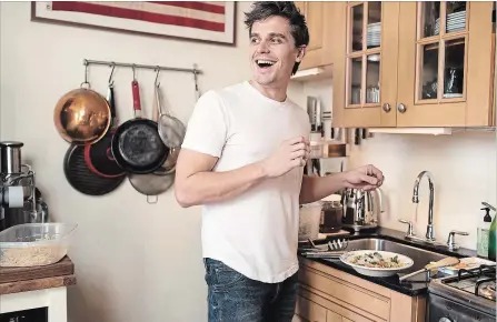  ?? KARSTEN MORAN NEW YORK TIMES ?? Antoni Porowski, a star of “Queer Eye” on Netflix, makes spaghetti at his apartment in New York. As the resident food and wine guy on the show, which had its première on Netflix in February, Porowski is responsibl­e for imparting humble lessons in home cooking to men who are undergoing weeklong transforma­tions.