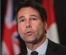  ?? DARRYL DYCK, THE CANADIAN PRESS FILE PHOTO ?? Ontario Health Minister Eric Hoskins is asking the doctors if they are willing to form a public-sector union and disclose their salaries.