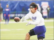  ?? Bill Kostroun / Associated Press ?? Giants tight end Evan Engram warms up before a game against the Redskins on Oct. 28.