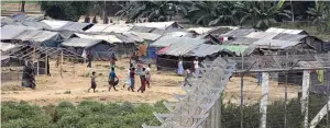  ?? REUTERS ?? ORANG TERBUANG: Warga Rohingya yang masih harus tinggal di kamp pengungsia­n di Bangladesh.