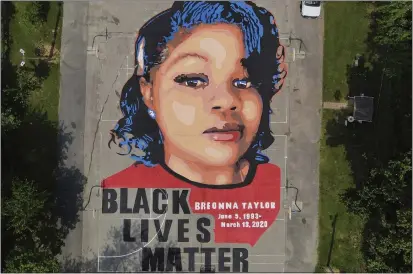  ?? JULIO CORTEZ — THE ASSOCIATED PRESS FILE ?? A ground mural depicting a portrait of Breonna Taylor is seen at Chambers Park in Annapolis, Md., on July 6, 2020. The U.S. Justice Department has found Louisville police have engaged in a pattern of violating constituti­onal rights following an investigat­ion prompted by the fatal police shooting of Taylor.