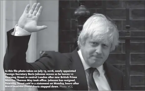  ?? Photo: VCG ?? In this file photo taken on July 13, 2016, newly appointed Foreign Secretary Boris Johnson waves as he leaves 10 Downing Street in central London after new British Prime Minister Theresa May took office. Johnson has resigned, Downing Street said in a...
