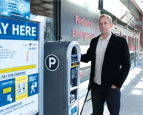  ?? MIKE BELL/PNG ?? Jon Buss, outside Surrey Memorial Hospital, is campaignin­g to eliminate paid parking from hospitals.