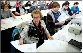  ?? NWA Democrat-Gazette/DAVID GOTTSCHALK ?? Erika Gold, a Holocaust survivor, participat­es in the Music as Propaganda break-out session Friday led by Deb Smith during the annual Holocaust Education Conference at The Jones Center.