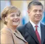  ??  ?? Merkel and husband Joachim Sauer