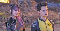  ?? ASSOCIATED PRESS FILE PHOTO ?? Shioli Kutsuna, left, and Brianna Hildebrand appear in a scene from Deadpool 2. Fox’s Deadpool 2 ended the three-week reign of Disney’s Avengers: Infinity War.