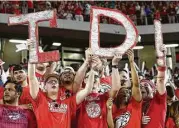  ?? Yi-Chin Lee / Houston Chronicle ?? The Cougars hope their fans have a lot to celebrate Thursday night when UH hosts nationally ranked Louisville at TDECU Stadium, where the Cougars have won 14 consecutiv­e games.