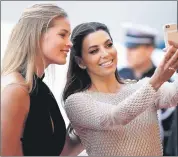  ??  ?? Eva Longoria, right, and model Doutzen Kroes