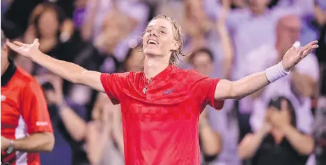  ?? MINAS PANAGIOTAK­IS/GETTY IMAGES ?? Denis Shapovalov of Canada celebrates his career-high victory over world No. 2 Rafael Nadal of Spain during the Rogers Cup at Uniprix Stadium on Thursday in Montreal. Shapovalov defeated Nadal 6-3, 4-6, 6-7.