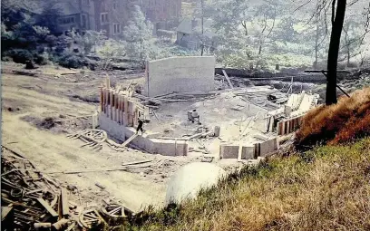  ??  ?? ●● Greenbooth reservoir under constructi­on in the 1960s. The project submerged the village of Greenbooth