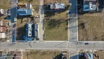  ?? Andrew Rush/Post-Gazette ?? The vacant lot at 243 Meadow St. in Larimer is all the Pittsburgh Land Bank has to show after seven years and spending at least $343,000.