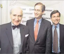  ?? Richard Drew Associated Press ?? ASTUTE BUSINESSMA­N Ralph Roberts, left, groomed his son Brian, center, to take over the company, bringing him to business meetings when he was a schoolboy. “Comcast … will live
forever, and that’s because of Ralph,” said NBCUnivers­al head Steve Burke.