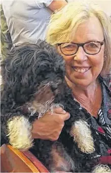  ?? TWITTER ?? Elizabeth May has always been a pet person. This picture of her, with dog Xiomara, is from a service for the blessing of the animals held at her church.