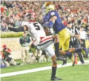  ?? PERRY MCINTYRE/GEORGIA PHOTO ?? Terry Godwin’s one-handed touchdown catch in last September’s 20-19 win at Notre Dame helped springboar­d Georgia to a memorable season that included its first Southeaste­rn Conference championsh­ip in 12 years.