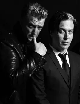  ??  ?? Josh Homme and Troy Van Leeuwen – bandmates for 15 years in QOTSA