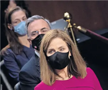  ??  ?? US Supreme Court nominee Amy Coney Barrett looks on during her confirmati­on hearing before the Senate Judiciary Committee