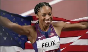  ?? FRANCISCO SECO — THE ASSOCIATED PRESS ?? Allyson Felix, of United States smiles after taking the bronze, in the final of women’s 400-meters at the Summer Olympics.