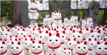  ??  ?? Photo shows cat figurines called ‘maneki-neko’ at the Gotokuji temple in Tokyo. — AFP photos